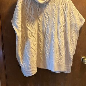 Luxurious Cable Knit Turtleneck Poncho with leather buckle side details